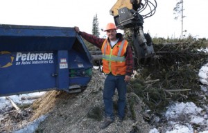 Morgan Larimore takes a break from operating a skidder at the WRR worksite.