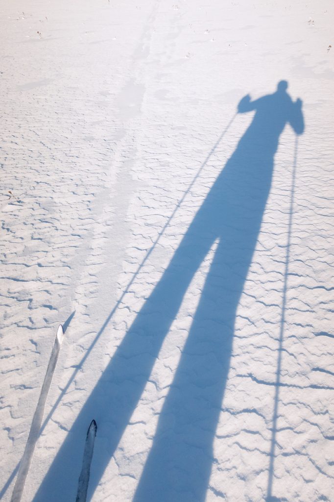skier shadow on snow
