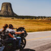 devils tower with motorists